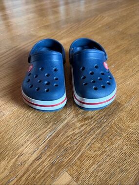 CROCS Kids size 11 Navy and Red Stripe Clogs